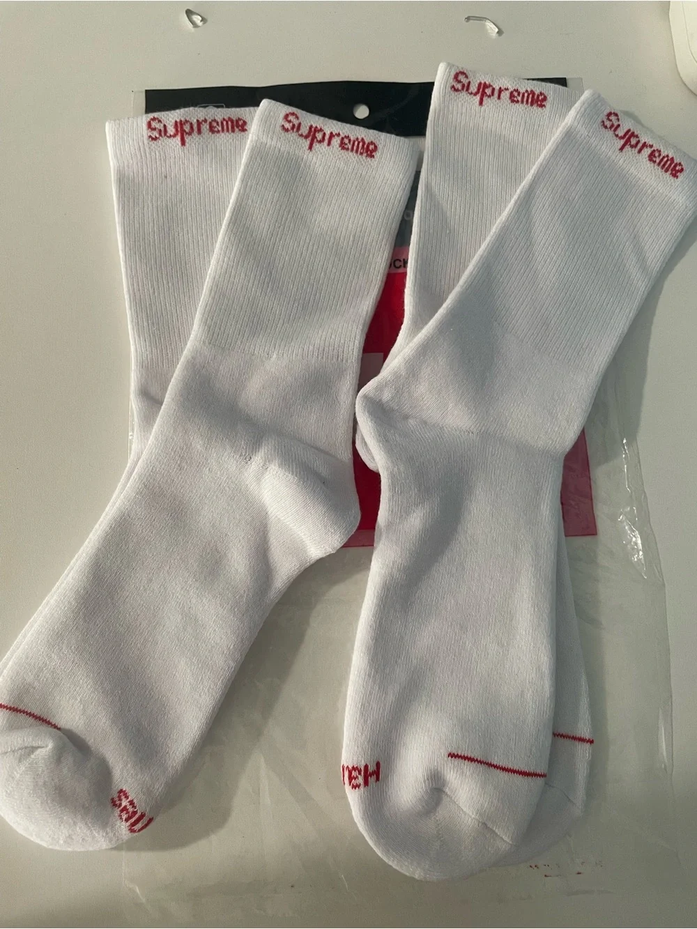 Hanes White Crew Socks with Red Supreme Logo - 4 Pairs